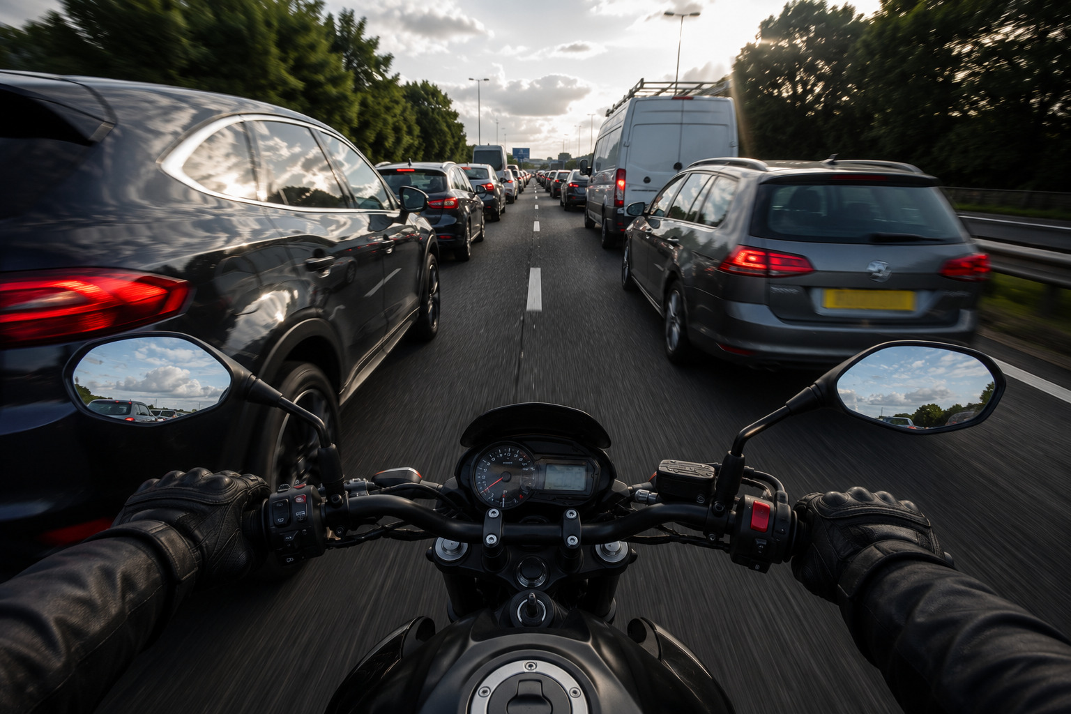 A motorcycle filtering through traffic