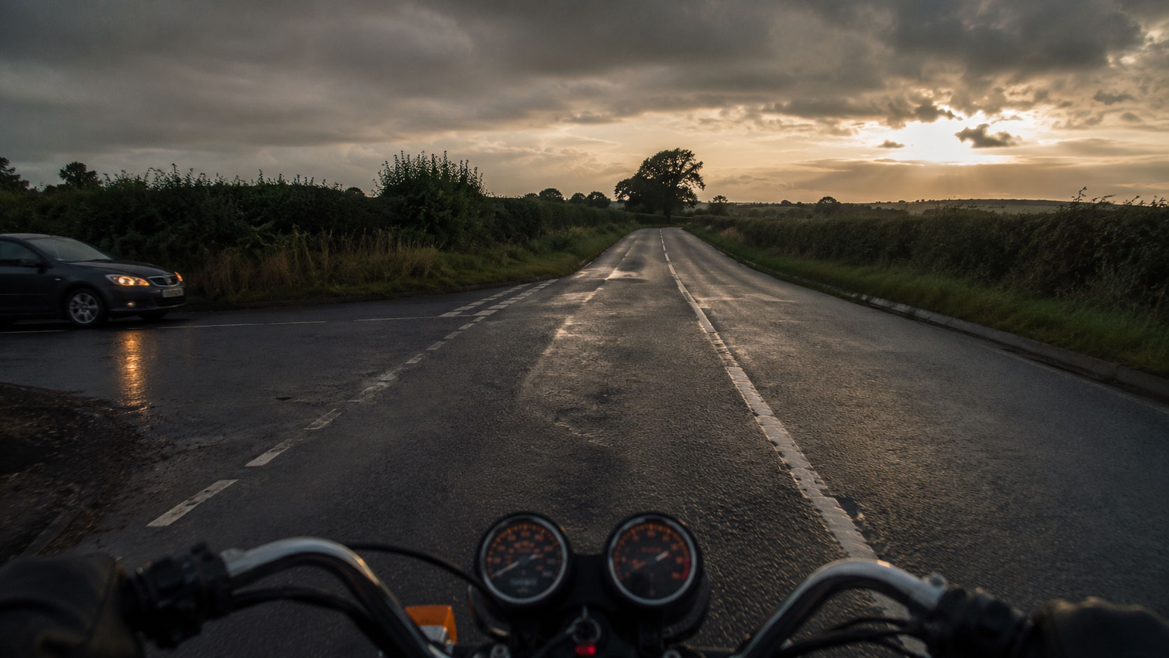 A motorcyclist approaching a junction