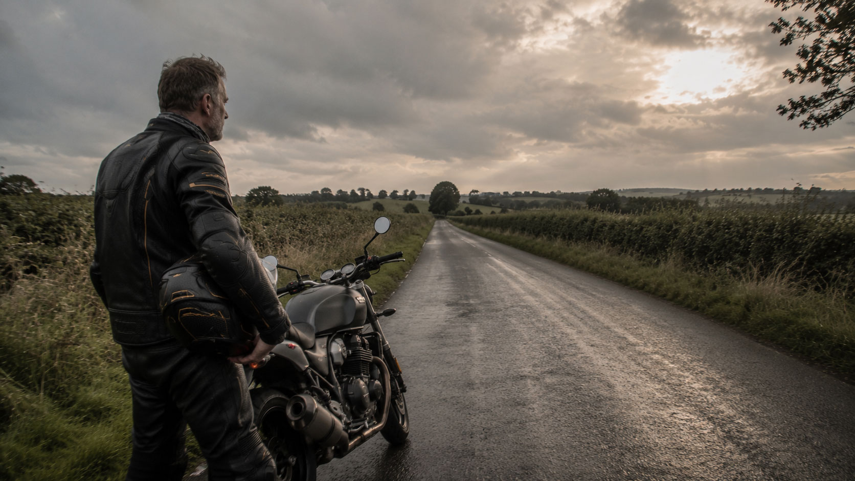 Returning riders on a wet road